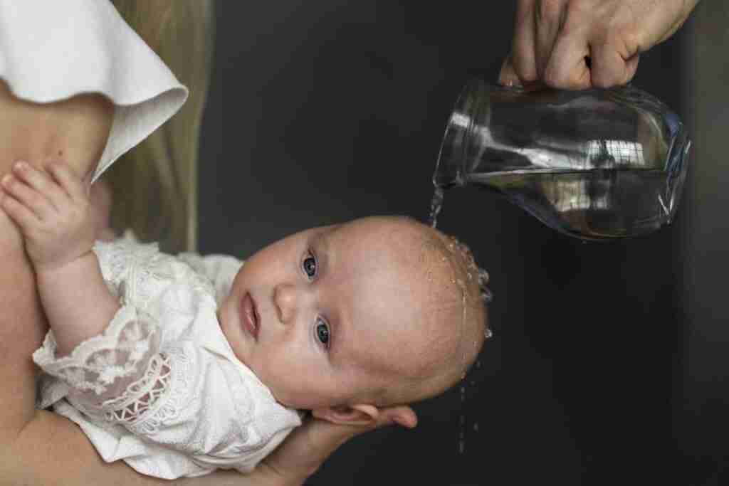 Che funzione hanno madrina e padrino nel battesimo?